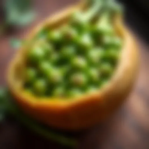 Close-up view of fresh green peas in a pod