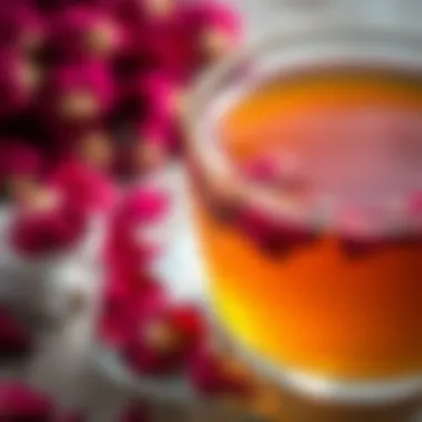 A close-up of a tea infusion with dried rose petals